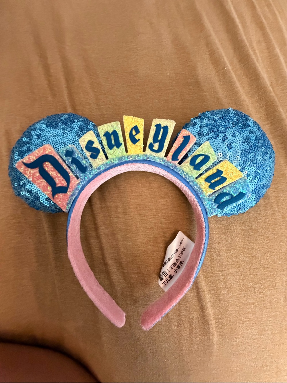 Disneyland Blue Sequin Ear Headband with Pink Band and Multicolor Lettering